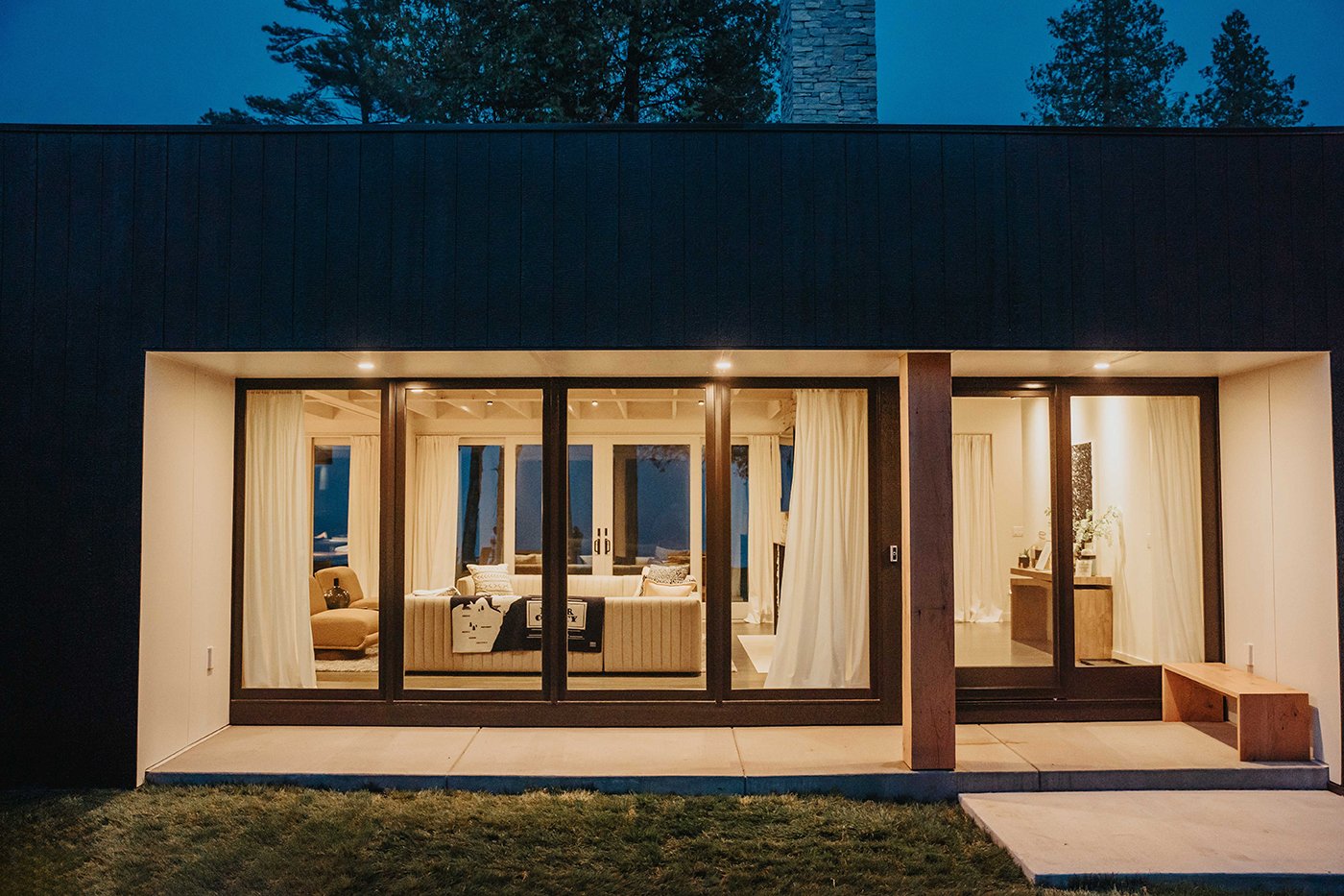 A view through walls of windows and doors through to the other side of the home. 